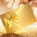 Gold gift card with ribbon and glitter